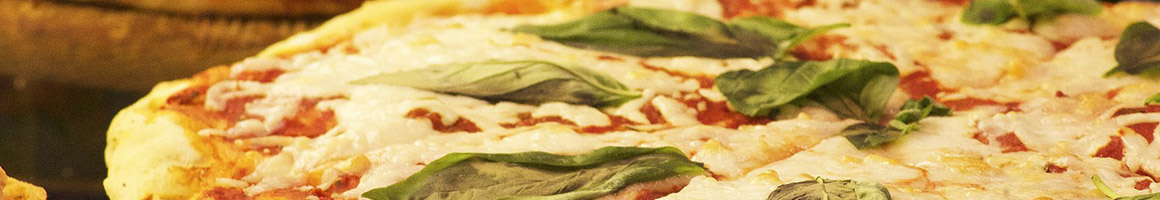 Eating Italian Pizza at Foschini's Brick Oven Kitchen restaurant in Dumont, NJ.